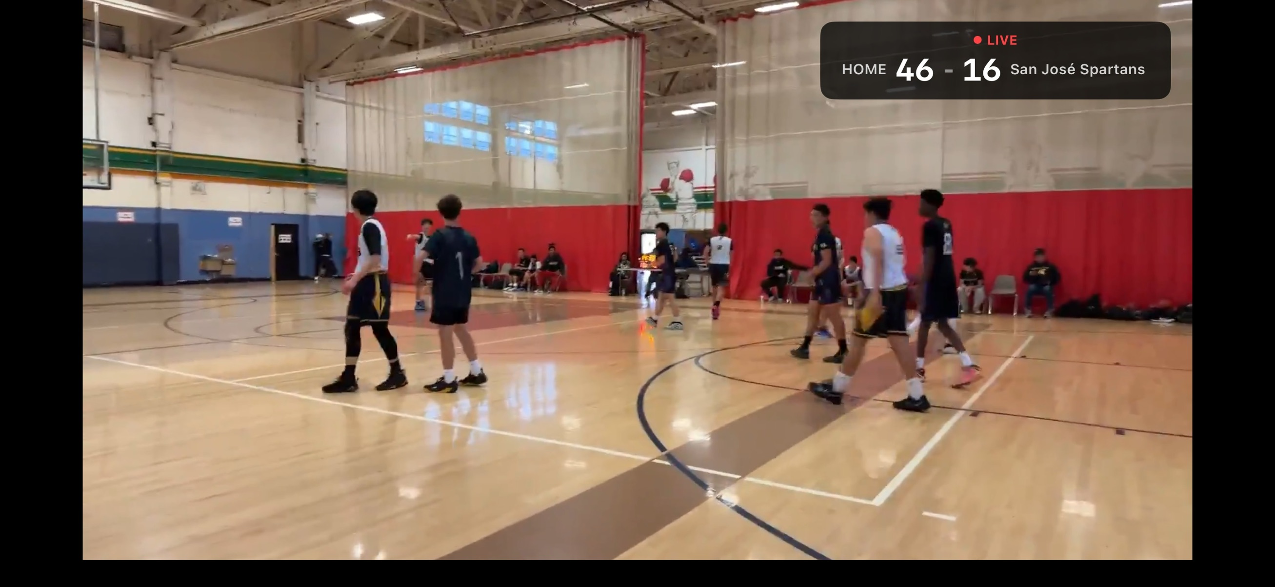A live game stream with the score on the video